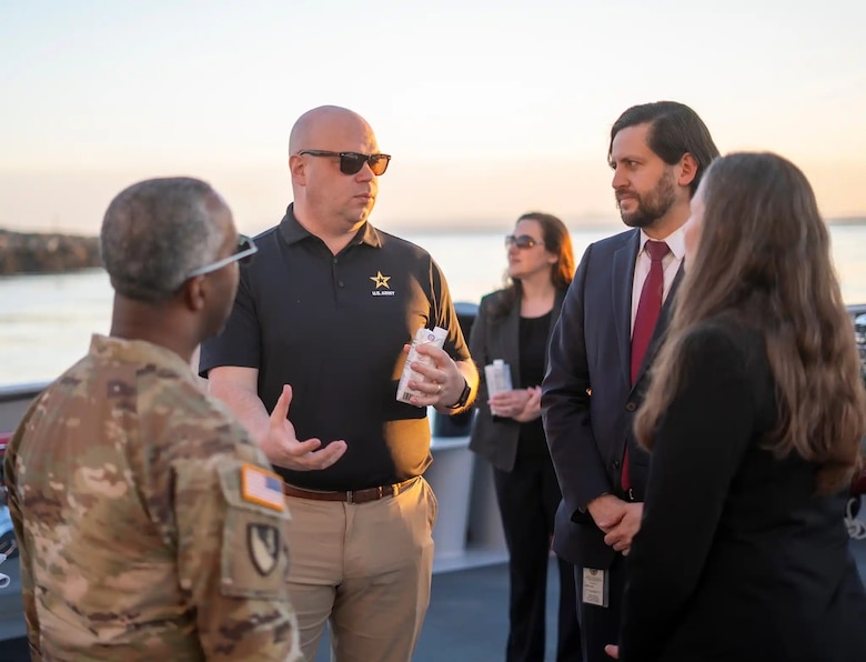 Assistant Secretary of the Army (Civil Works) Adam Telle, second from left, speaks to representatives with the Port of Long Beach during a Feb. 4 visit the port in Long Beach, California.