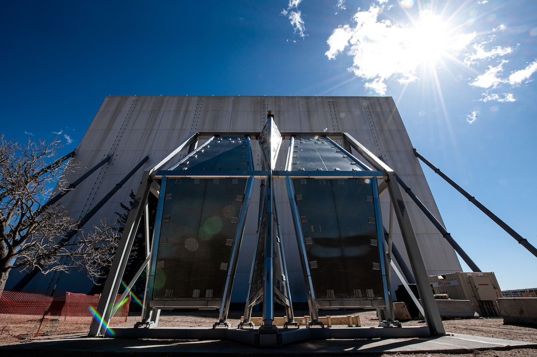 Contractors display an example of the water barrier that engineers are testing to prevent moisture damage to the interior of the U.S. Air Force Academy’s Cadet Chapel, March 30, 2023. Academy officials closed the chapel in 2019 for the $220 million renovation that they expect contractors to complete by 2027. (U.S. Air Force photo by Trevor Cokley)