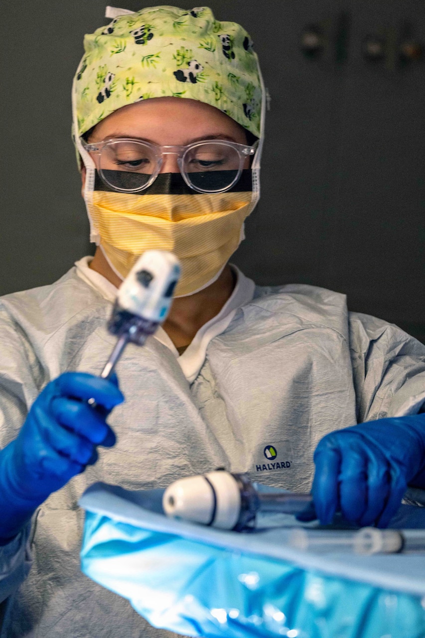 Hospital Corpsman 2nd Class Katherine Cordonrosario, from Kissimmee, Florida, temporarily assigned to Pre-Commissioning Unit John F. Kennedy (CVN 79) from USS Harry S. Truman (CVN 75), prepares medical equipment for the ship’s first at-sea surgery which occurred during Builder’s Trials, Feb. 1, 2026. Builder’s Trials provide an opportunity to test ship systems and components at sea for the first time, and make required adjustments prior to additional underway testing. (U.S. Navy photo by Mass Communication Specialist 1st Class Tyrell K. Morris)