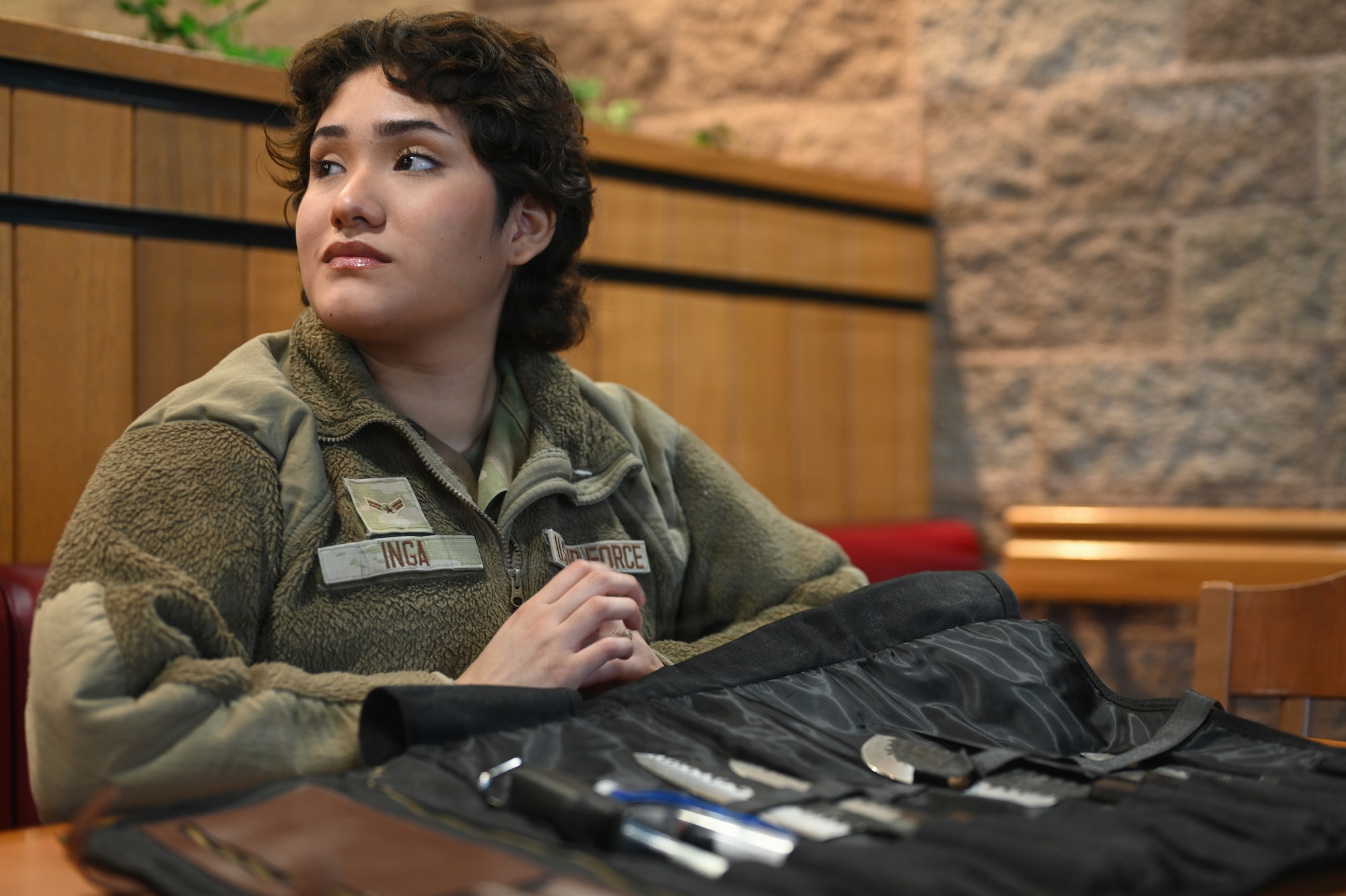 U.S. Air Force Airman 1st Class Ivana Inga, 673d Force Support Squadron primary accountant, poses with the knife set awarded to her Joint Base Elmendorf-Richardson, Alaska, Feb. 3, 2026. After winning the local JBER competition, Inga competed head-to-head with winners from 11 other Air Force bases at the Services Hospitality Epicurean Faceoff culinary battle at the Culinary Institute of America in San Antonio, Texas, and ultimately emerged as champion. (U.S. Air Force photo by Airman 1st Class Eli A. Rose)