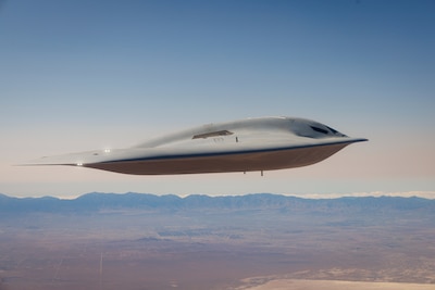 An image of the B-21 flying.