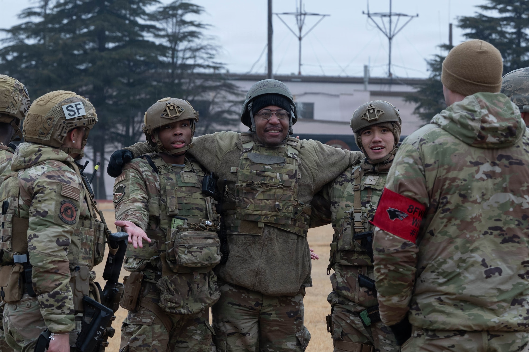 Airmen join Wing Inspection Team member for feedback.