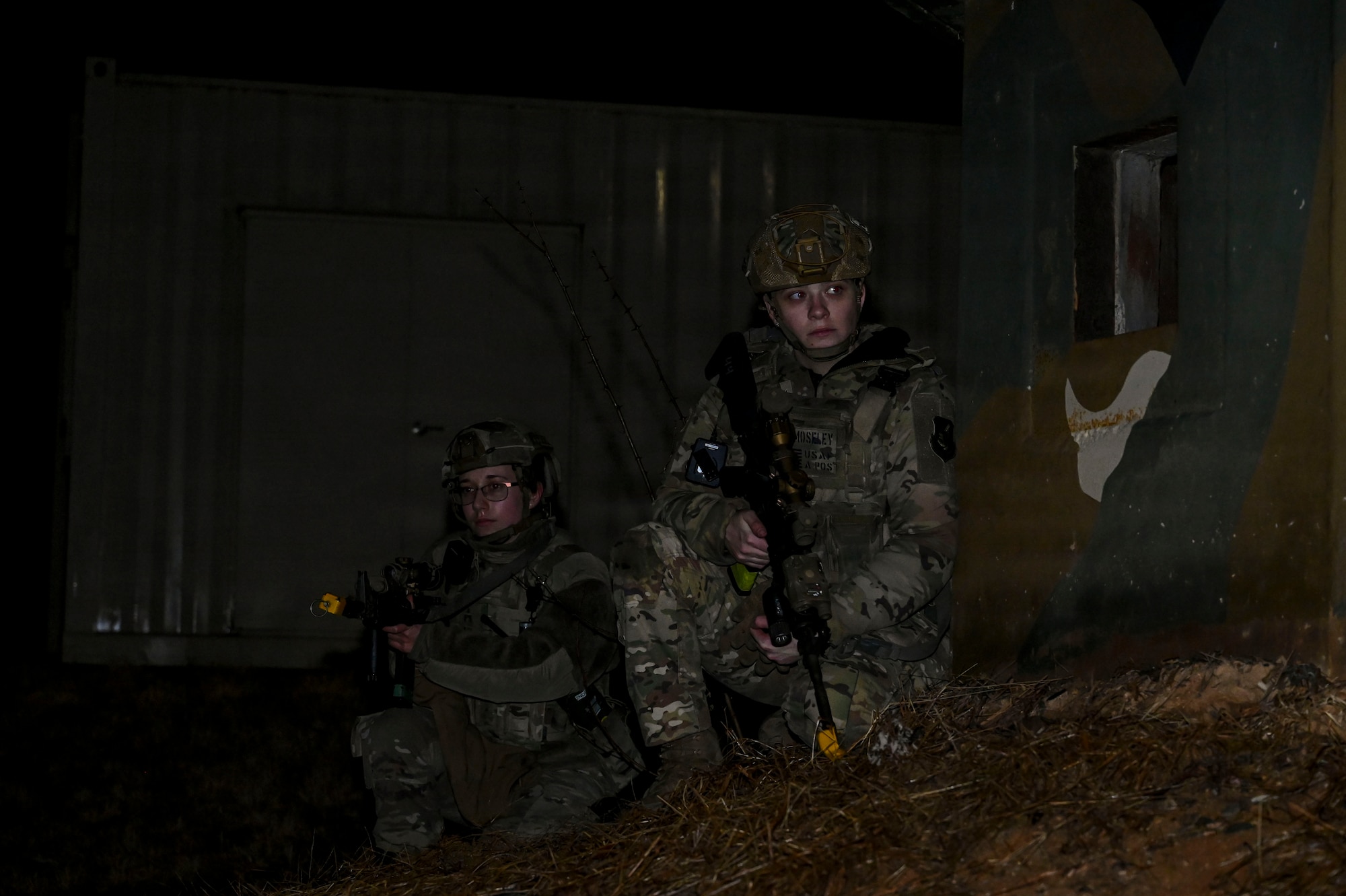 Airmen hold defensive positions.