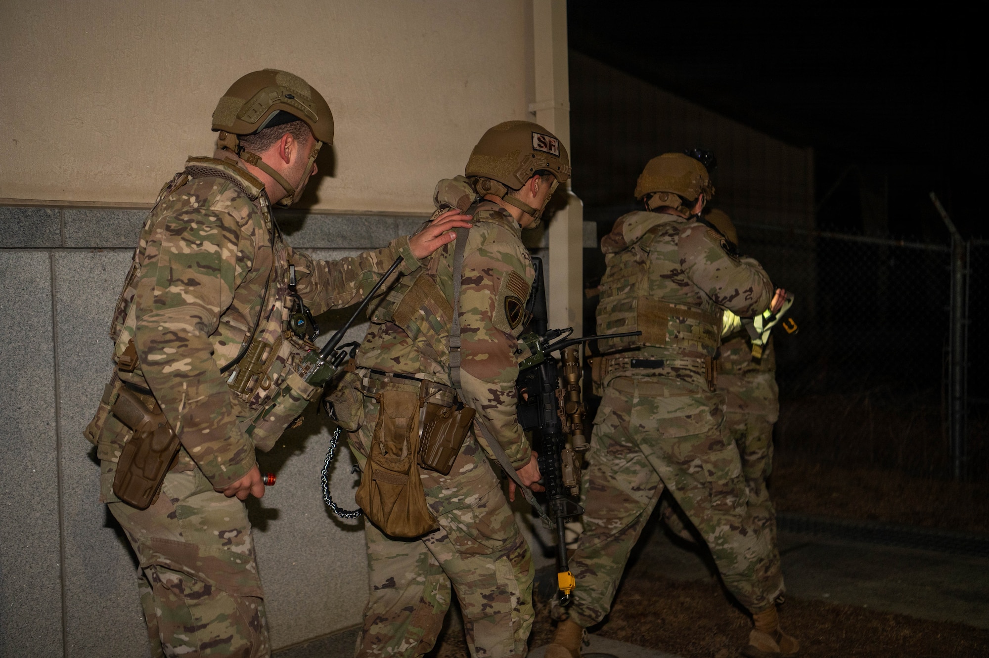 Defenders clear room.