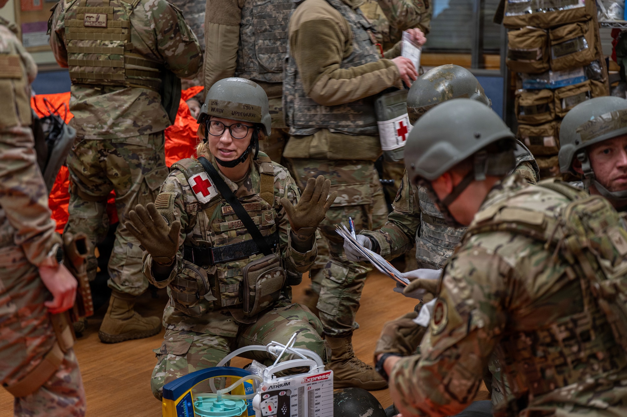 Airman instructs on how to triage a patient.