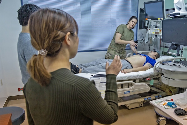YOKOSUKA, Japan (Feb. 11, 2026) — Dr. Kaori Ito, a general surgeon and Advanced Trauma Life Support instructor proctors the examination portion of the Advanced Trauma Life Support course at U.S. Naval Hospital Yokosuka. The American College of Surgeons supervised course emphasizes rapid assessment and decisive early intervention in forward deployed medical settings, strengthening joint medical readiness across mainland Japan. (U.S. Navy photo by Daniel Taylor/U.S. Naval Hospital Yokosuka Public Affairs)
