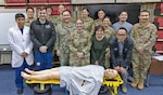 YOKOSUKA, Japan (Feb. 11, 2026) — Students and instructors pose for a group photo following completion of the Advanced Trauma Life Support course at U.S. Naval Hospital Yokosuka. The most recent class included two Navy physicians, five Air Force physicians and one host nation participant, reinforcing joint interoperability and theater medical readiness. (U.S. Navy photo by Daniel Taylor/U.S. Naval Hospital Yokosuka Public Affairs)
