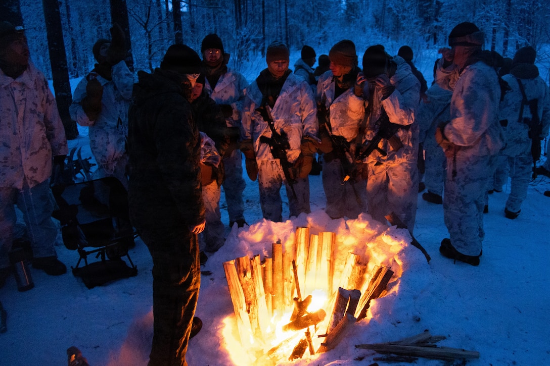 U.S. Marines with 2nd Battalion, 6th Marine Regiment, 2nd Marine Division, build a fire at Cold Weather Training during exercise Cold Response 26 in Setermoen, Norway, Feb. 11, 2026.  A key component of NATO's enhanced vigilance activity Arctic Sentry, exercise Cold Response 26 is a Norwegian-led winter military exercise designed to enhance collective defense capabilities and ensure U.S. readiness to rapidly deploy and seamlessly operate alongside NATO Allies in challenging arctic conditions. (U.S. Marine Corps photo by Cpl. Xavier Alicea)
