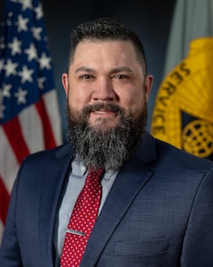 Adam S. Hammack, U.S. Army Financial Management Command Operations training and development specialist, poses for a photo at the Maj. Gen. Emmett J. Bean Federal Center in Indianapolis Feb. 24, 2026. USAFMCOM delivers precision enterprise-wide financial operations to integrate, synchronize and sustain the battlefield through the Joint Strategic Support Area and directly supports the Office of the Assistant Secretary of the Army for Financial Management and Comptroller in their role as the principal advisor on all matters related to financial management and comptrollership. (U.S. Army photo by Mark R. W. Orders-Woempner)