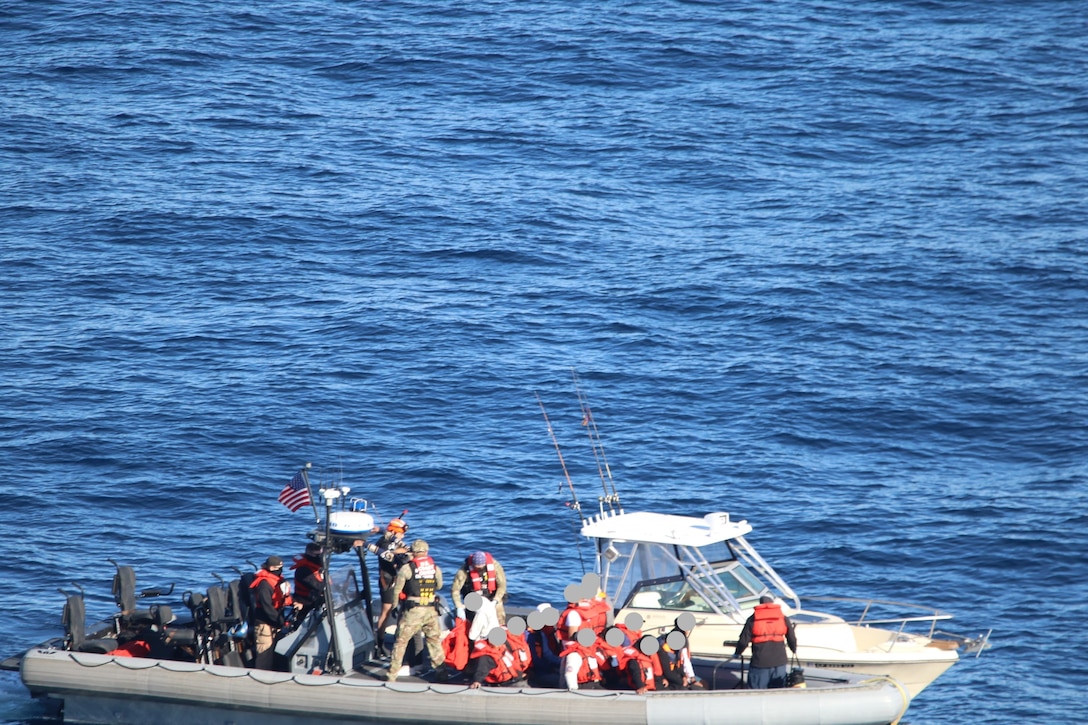 The U.S. Coast Guard and Department of Homeland Security partner agencies interdict a suspected maritime smuggling vessel during coordinated operations south of San Clemente Island, California, Feb. 21, 2026. In total, crews interdicted five vessels and apprehended 62 aliens in under 90 minutes. (U.S. Coast Guard courtesy photo)