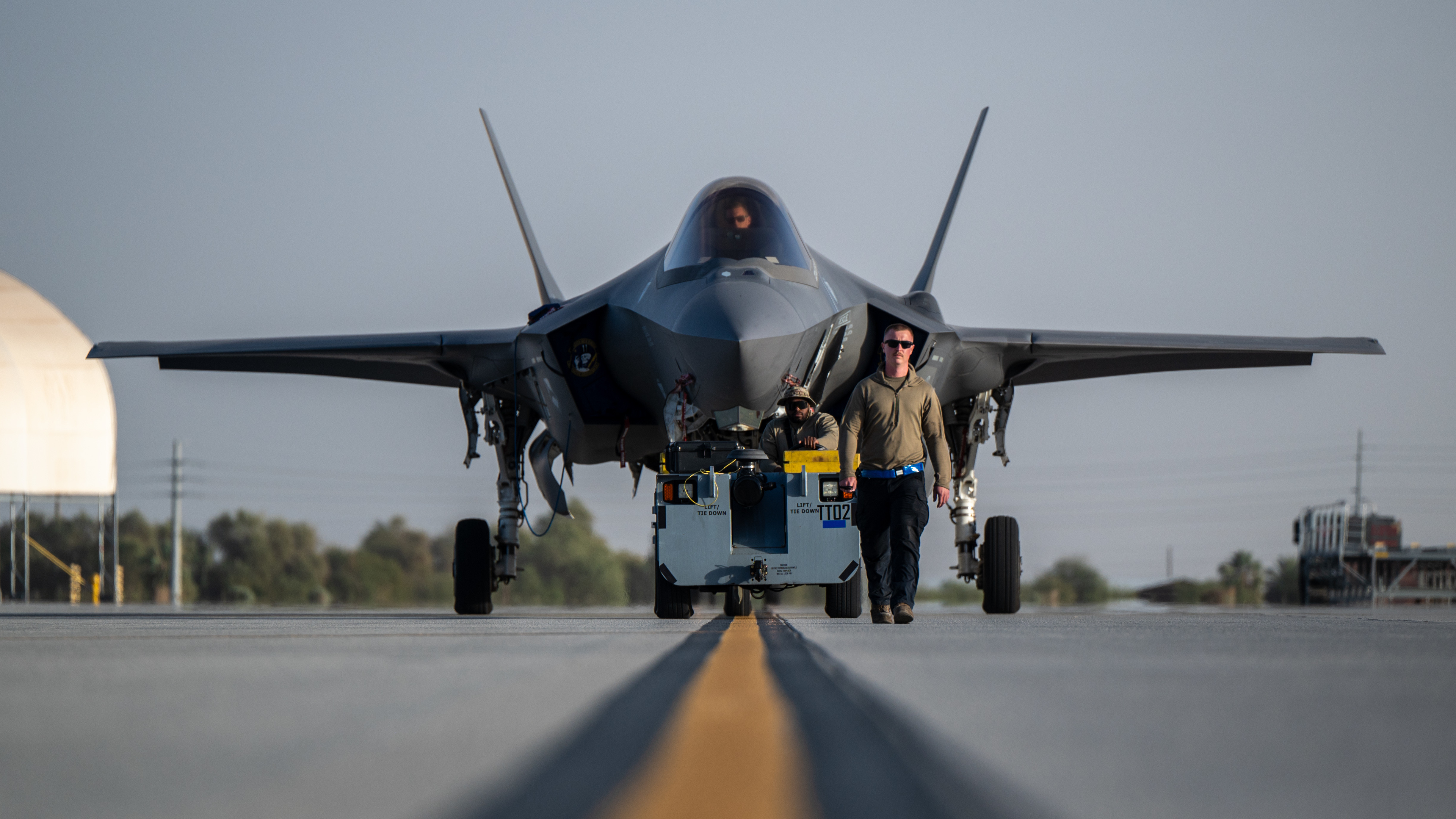U.S. Airmen assigned to the 95th Fighter Generation Squadron tow an F-35A Lightning II during exercise Bamboo Eagle 26-1.