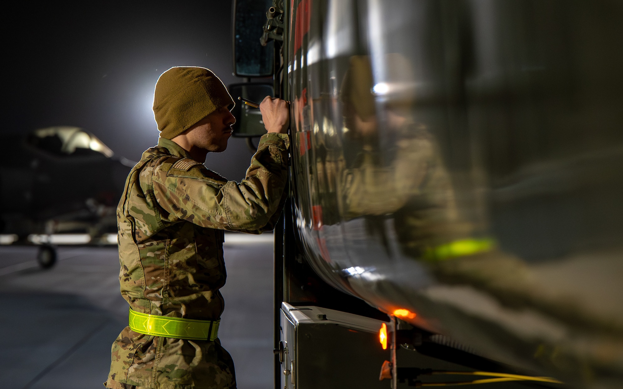 U.S. Air Force Senior Airman Preston Bromaghin, 325th Logistics Readiness Squadron fuels service center controller, prepares to refuel an F-35A Lightning II during exercise Bamboo Eagle 26-1.
