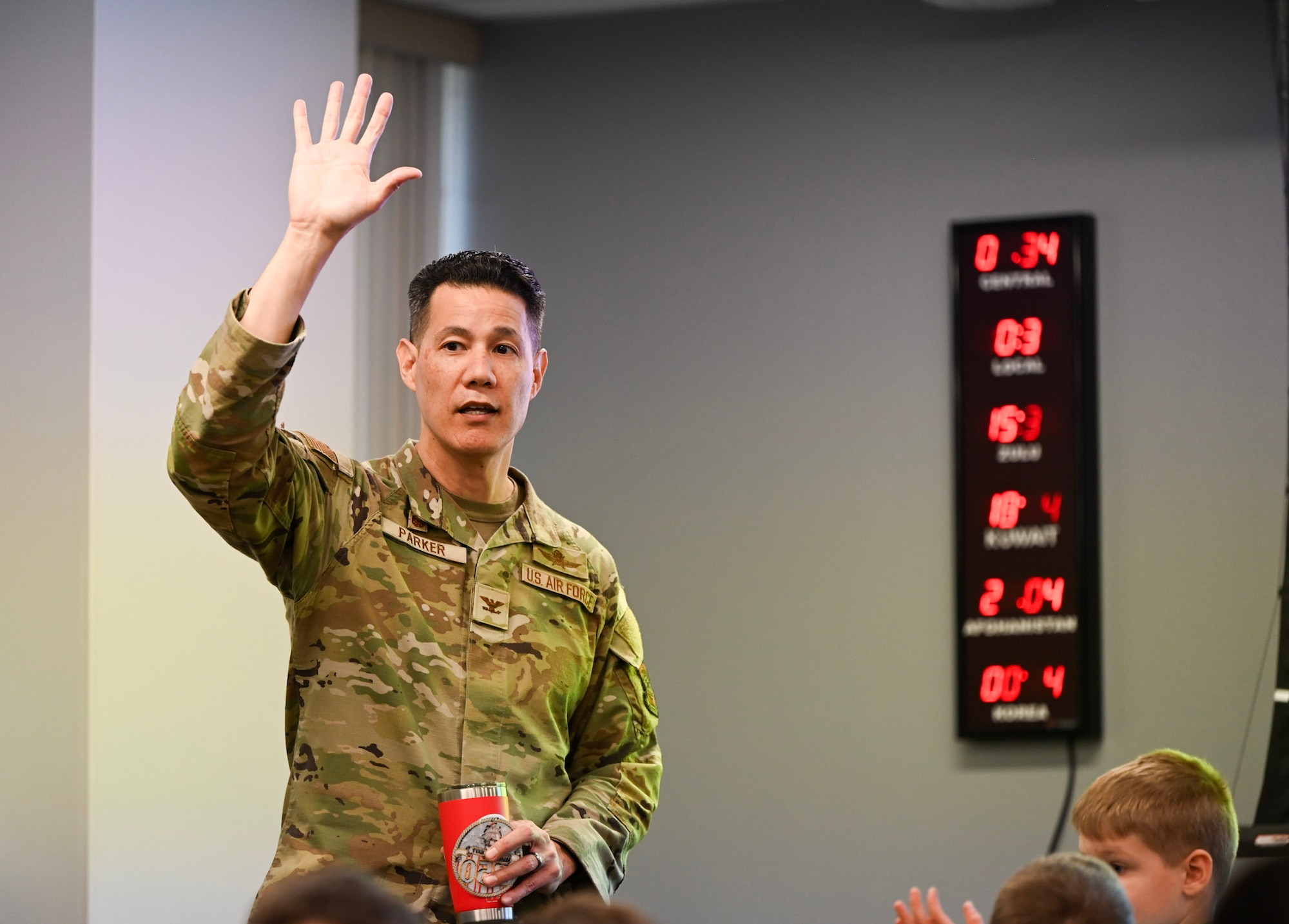 U.S. Air Force Col. Jason Parker, 628th Air Base Wing and Joint Base Charleston commander, asks military homeschoolers of the Lowcountry who have parents currently in the U.S. Air Force service during a wing building tour at Joint Base Charleston.