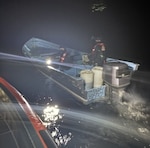 A Coast Guard Cutter Forrest Rednour boarding team interdicts a suspected alien smuggling vessel.