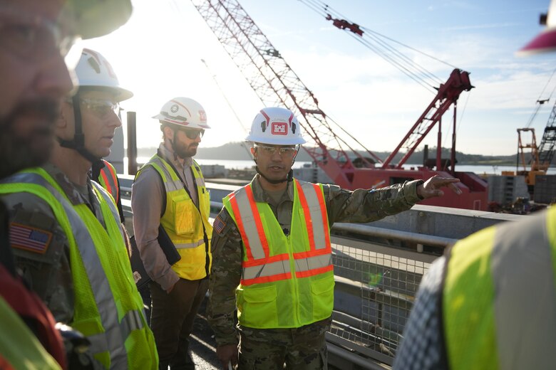 CHATTANOOGA, Tenn. (Feb. 20, 2026) – Lt. Col. Guillermo Guandique, commander of the U.S. Army Corps of Engineers Nashville District, briefs Col. Herlihy, commander of the Great Lakes and Ohio River Division, during a tour of the Chickamauga Lock Replacement Project in Chattanooga, Tennessee, Feb. 20, 2026. Progress on the multi-contract project includes the new lock chamber at 76 percent completion and the upstream approach wall at 70 percent, with the final contract awarded in February. The new 110-by-600-foot lock will process nine jumbo barges in one lockage, compared to one in the existing lock, an 80% increase in efficiency for the navigation industry.