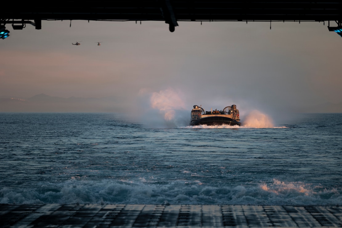 U.S. Navy Landing Craft, Air Cushion 48 attached to Assault Craft Unit 5, embarks Wasp-class amphibious assault ship USS Boxer (LHD 4) during ship-to-shore operations in the Pacific Ocean, Feb. 23, 2026.
