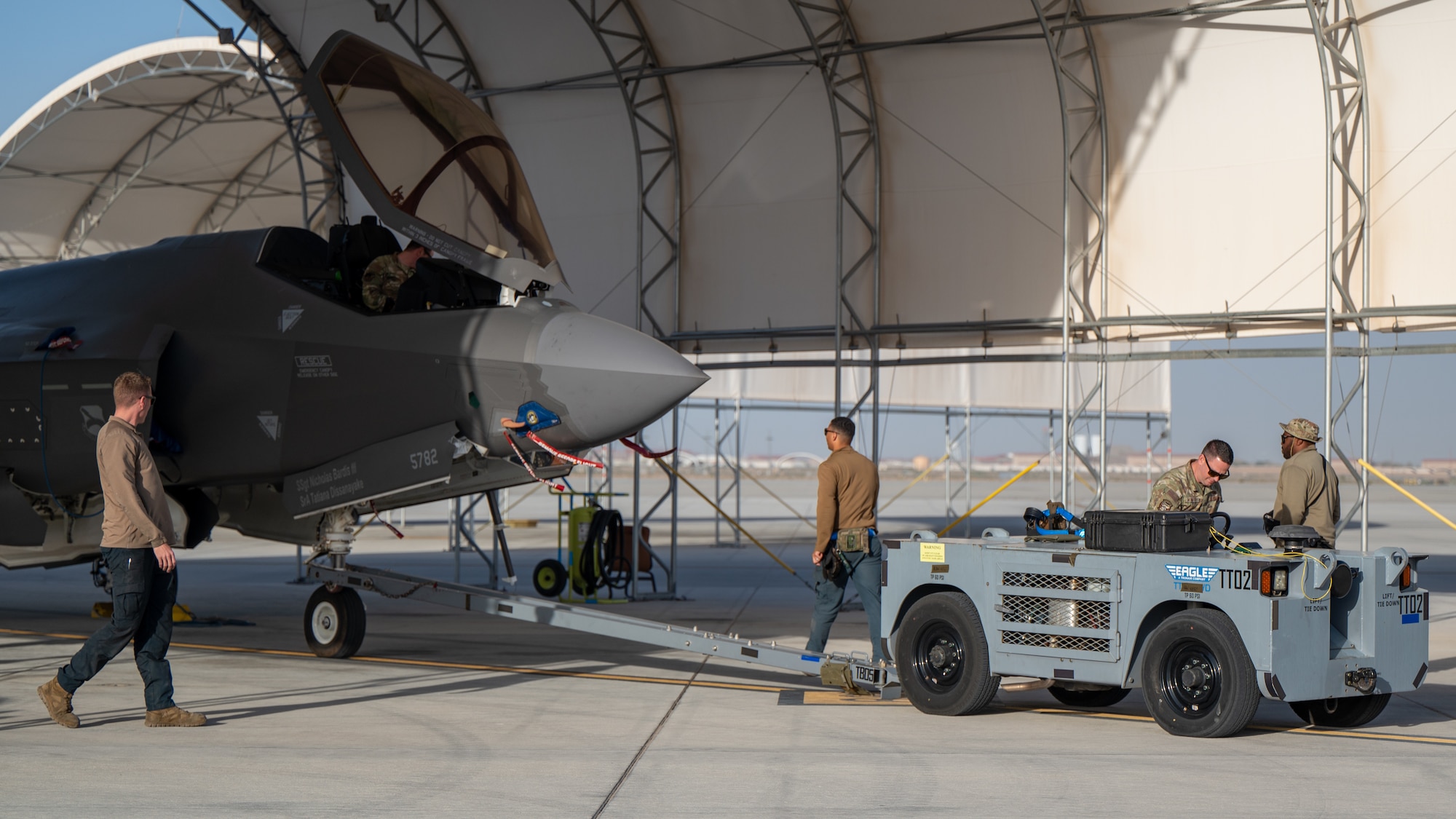 U.S. Airmen assigned to the 95th Fighter Generation Squadron prepare to tow an F-35A Lightning II during exercise Bamboo Eagle 26-1.