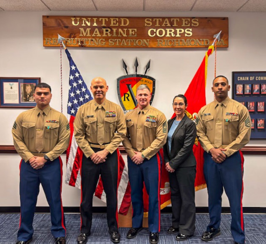 U.S. Marine Corps Maj. Gen. Walker M. Field, commanding general of Marine Corps Recruiting Command, and Dr. Kendy Vierling, principal advisor of Military Manpower and Personnel, award Staff Sgt. Luis A. BonesMerced, a canvassing recruiter and assistant station commander for Recruiting Substation Petersburg, and Sgt. Jose A. ArguetaMejia, an operations clerk with Recruiting Station Richmond, with Navy and Marine Corps Achievement Medals in Richmond, Virginia, Feb. 19, 2026. These Marines were recognized for their superior performance and direct contribution to mission success of RS Richmond.