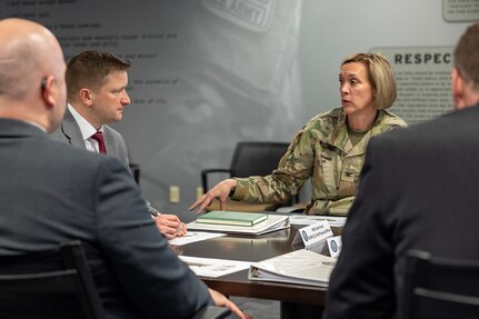 Col. Michelle M. Williams, U.S. Army Financial Management Command commander, center right, briefs Jules W. Hurst III, senior official performing the duties of the Under Secretary of War (Comptroller) and chief financial officer, center left, as Art Miller, Deputy Comptroller for OUSW(C) Budget and Appropriations Affairs, and Ryan A. Busby, Deputy Assistant Secretary of the Army for Financial Operations and Information, during a meeting at the Maj. Gen. Emmett J. Bean Federal Center in Indianapolis Feb. 23, 2026. During the meeting, USAFMCOM provided a high-level overview of the two-star command’s mission support to the U.S. Army Materiel Command as well as its direct support to ASA (FM&C), outlining enterprise-level capabilities and authorities across the Army financial management portfolio, including Reserve Component integration. (U.S. Army photo by Mark R. W. Orders-Woempner)