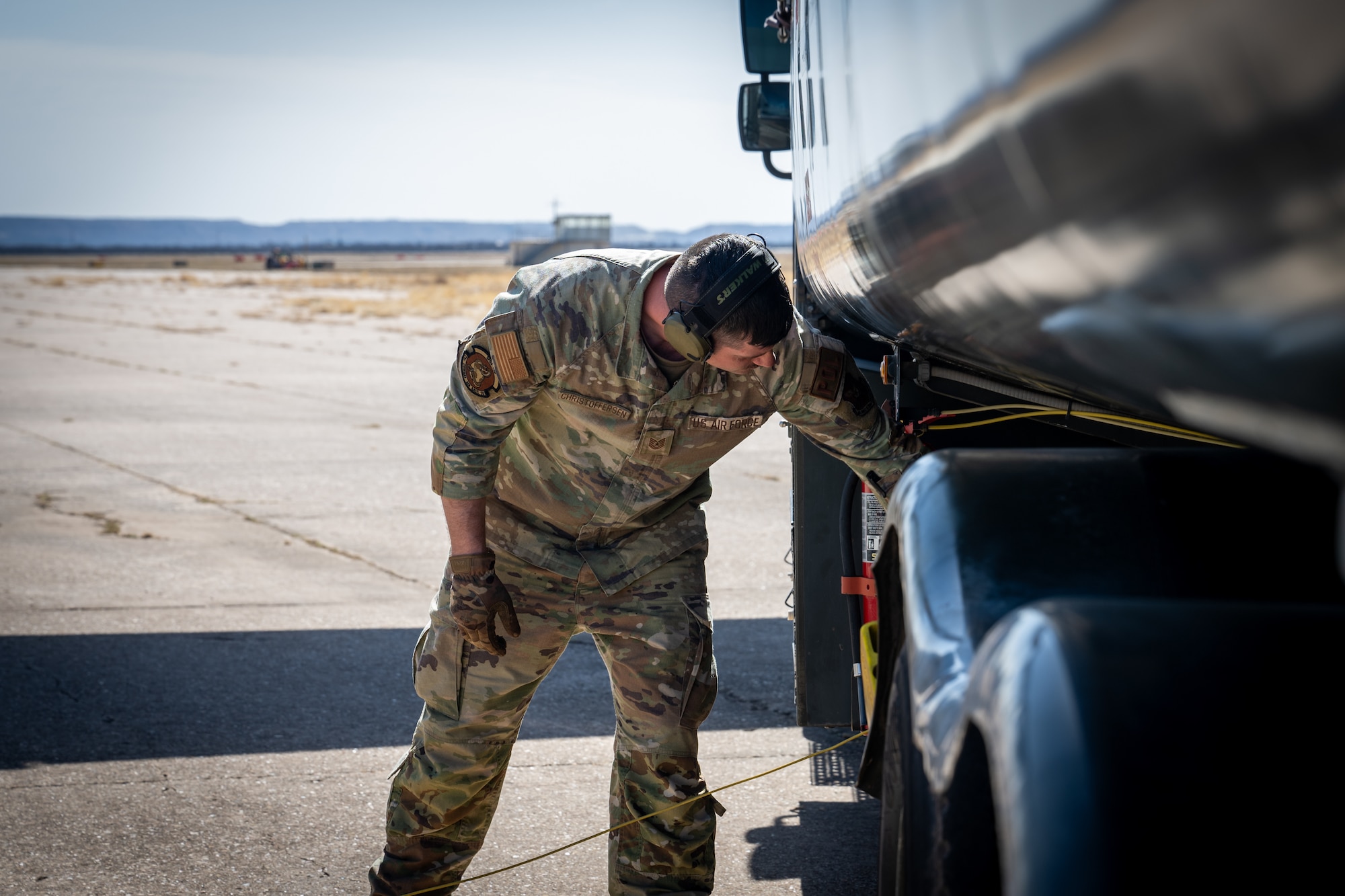 U.S. Air Force Tech. Sgt. Cory Christoffersen, 21st Combat Air Base Squadron noncommissioned officer in charge of fuels and hydrants, shuts a valve off on a fuel truck used for a hot pit refuel during exercise Bamboo Eagle 26-1 at Dyess Air Force Base, Texas, Feb. 18, 2026. BE 26-1 strengthened the 21st Air Task Force’s ability to generate combat air power in contested environments by reinforcing Agile Combat Employment principles. (U.S. Air Force photo by Airman 1st Class Adrien Tran)