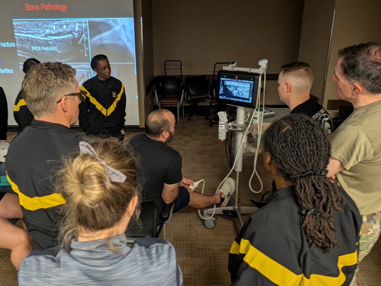 Attendees participating in Expeditionary Point of Care Ultrasound training at Carl R. Darnall Army Medical Center practice ultrasound-guided vascular access, a skill that supports faster treatment in clinical and operational settings.