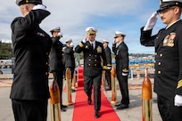 NAVAL BASE POINT LOMA, Calif. (Feb. 17, 2026) – Cmdr. Spencer Ovren, commanding officer, Los Angeles-class fast-attack submarine USS Greeneville (SSN 772), renders a salute to side boys following the change of command ceremony for Greeneville onboard Naval Base Point Loma, Feb. 17, 2026.  During the ceremony, Cmdr. Chad Tella was relieved by Ovren as commanding officer of Greeneville. Greeneville is assigned to Commander, Submarine Squadron 11, home to four Los Angeles-class fast-attack submarines, which are capable of supporting various missions, including anti-submarine warfare, anti-ship warfare, strike warfare and intelligence, surveillance and reconnaissance. (U.S. Navy photo by Mass Communication Specialist 2nd Class Rashan Jefferson)