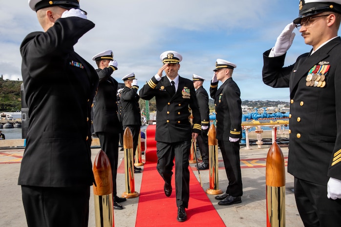 NAVAL BASE POINT LOMA, Calif. (Feb. 17, 2026) – Cmdr. Spencer Ovren, commanding officer, Los Angeles-class fast-attack submarine USS Greeneville (SSN 772), renders a salute to side boys following the change of command ceremony for Greeneville onboard Naval Base Point Loma, Feb. 17, 2026.  During the ceremony, Cmdr. Chad Tella was relieved by Ovren as commanding officer of Greeneville. Greeneville is assigned to Commander, Submarine Squadron 11, home to four Los Angeles-class fast-attack submarines, which are capable of supporting various missions, including anti-submarine warfare, anti-ship warfare, strike warfare and intelligence, surveillance and reconnaissance. (U.S. Navy photo by Mass Communication Specialist 2nd Class Rashan Jefferson)