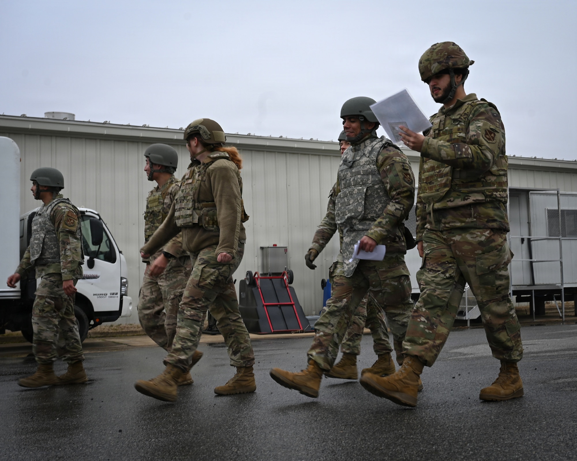 photo of Airmen navigating through checkpoints during Prime Base Engineer Emergency Force (Prime BEEF) training