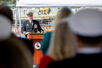 260217-N-DO408-1215 NAVAL BASE POINT LOMA, Calif. (Feb. 17, 2026) Cmdr. Chad Tella, off-going commanding officer, Los Angeles-class fast-attack submarine USS Greeneville (SSN 772), delivers remarks during the change of command ceremony for Greeneville onboard Naval Base Point Loma, Feb. 17, 2026.  During the ceremony, Tella was relieved by Cmdr. Spencer Ovren as commanding officer of Greeneville. Greeneville is assigned to Commander, Submarine Squadron 11, home to four Los Angeles-class fast-attack submarines, which are capable of supporting various missions, including anti-submarine warfare, anti-ship warfare, strike warfare and intelligence, surveillance and reconnaissance. (U.S. Navy photo by Mass Communication Specialist 2nd Class Rashan Jefferson)