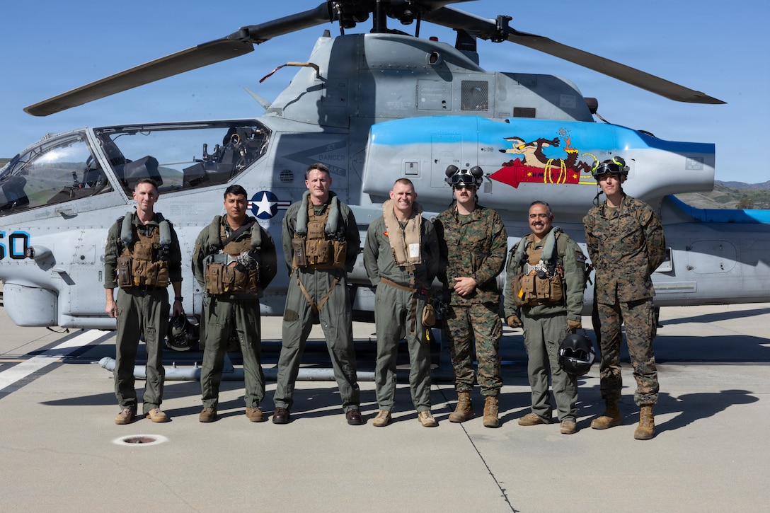 U.S. Marines with Marine Light Attack Helicopter Squadron (HMLA) 775, Marine Aircraft Group 41, 4th Marine Aircraft Wing, pose for a photo with Brig. Gen. Patrick Tiernan, commanding general, 4th Marine Aircraft Wing after a successful operational training at Marine Corps Air Station, Camp Pendleton, California, Jan. 29, 2026. During this period, Marines with HMLA-775 showcased tactical proficiency and lethality of the UH-1Y to the commanding general. (U.S. Marine Corps photo by Lance Cpl. Allan Rodriguez-Rivera)
