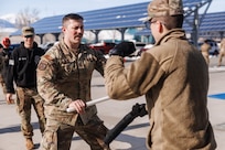 U.S. Air Force Tech Sgt. Adams, 152nd Medical Group, practices defending himself using his baton during a National Guard Response Force training at the Office of the Adjutant General in Carson City, Nevada, Feb. 20, 2026. NGRF personnel will be prepared to respond to Nevada's needs, ready within 24 hours activation, like the activation during the Davis Creek fire in 2024 to safeguard evacuated neighborhoods. (U.S. Army National Guard photo by Sgt. Adrianne Lopez)