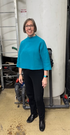 Rita Schuh, an environmental engineer at Naval Surface Warfare Center, Carderock Division, stands in the command's Ballast Water Research Laboratory in West Bethesda, Md. Schuh, who has served in the government for 37 years, supports the Uniform National Discharge Standards and Ballast Water programs to standardize environmental regulations for the fleet.