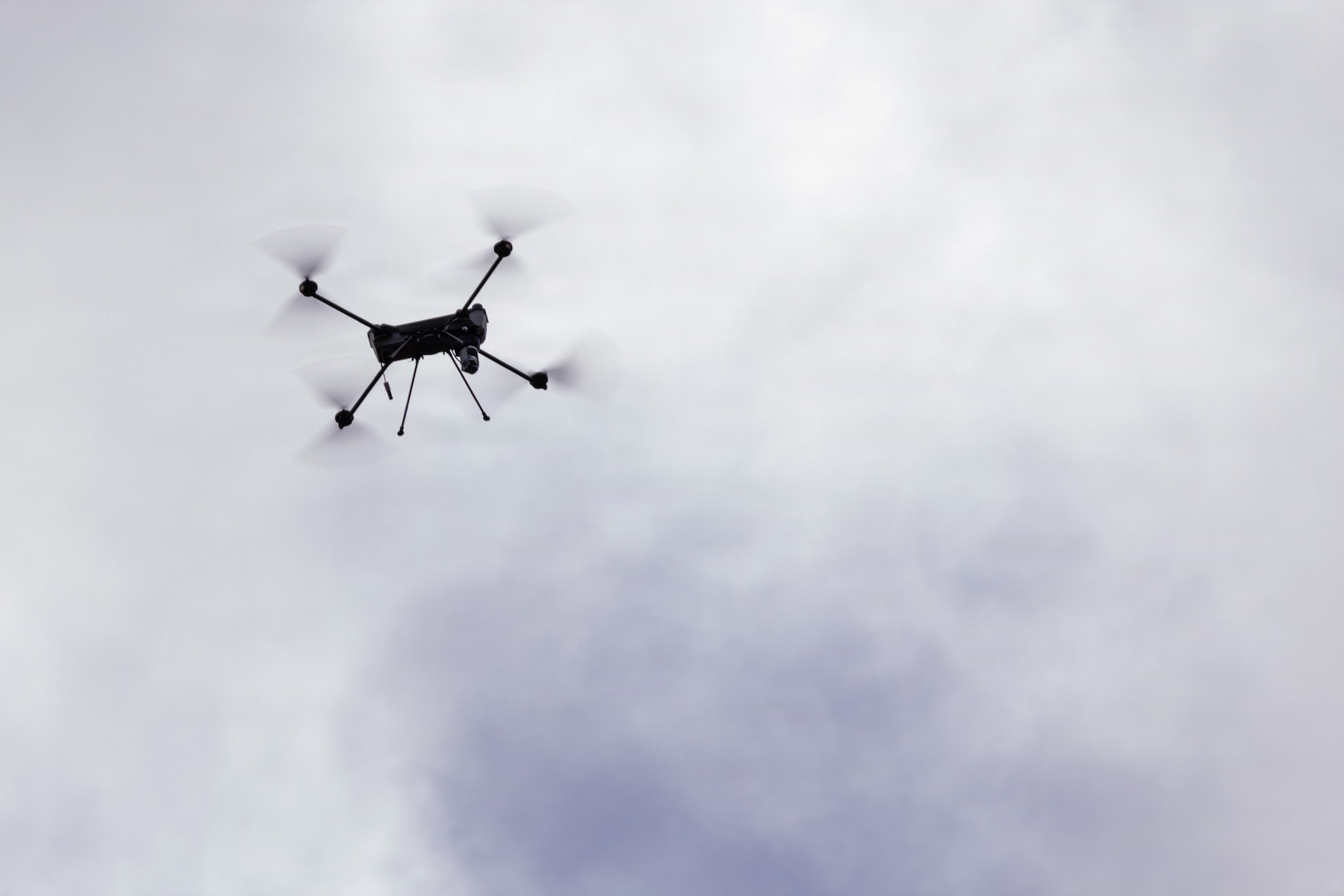 A drone hovers overhead for a photo.