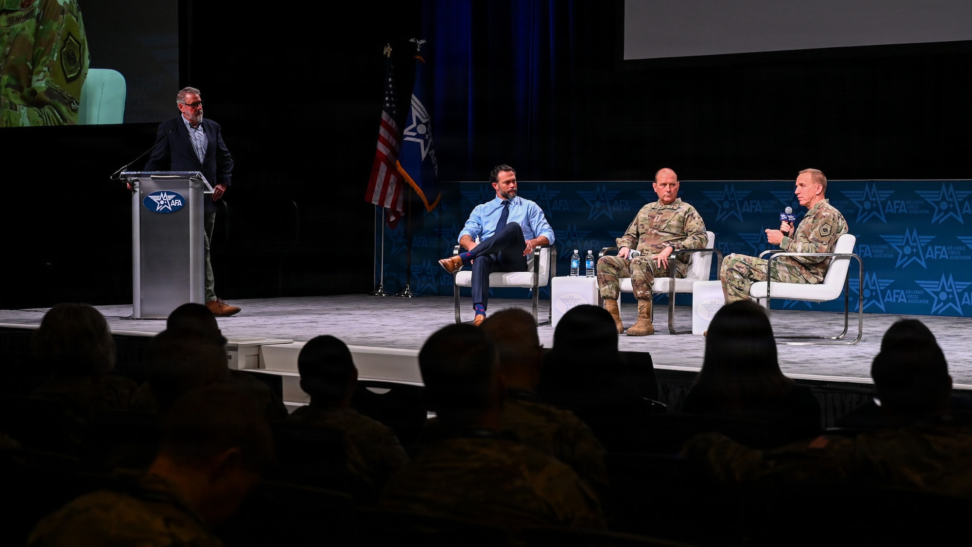 Air Force leaders speak at a panel.