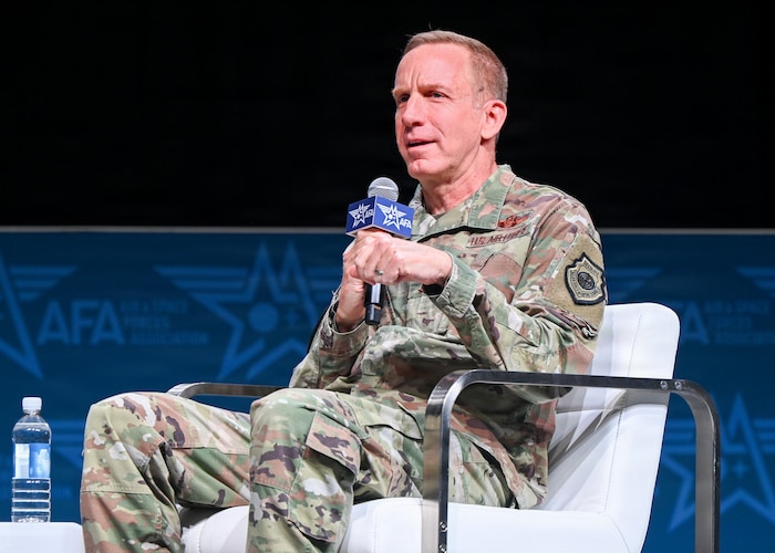 An Air Force leader speak at a panel.