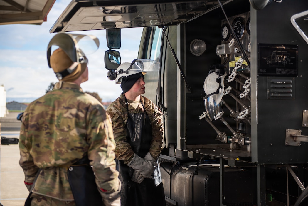 Airman stands fire guard