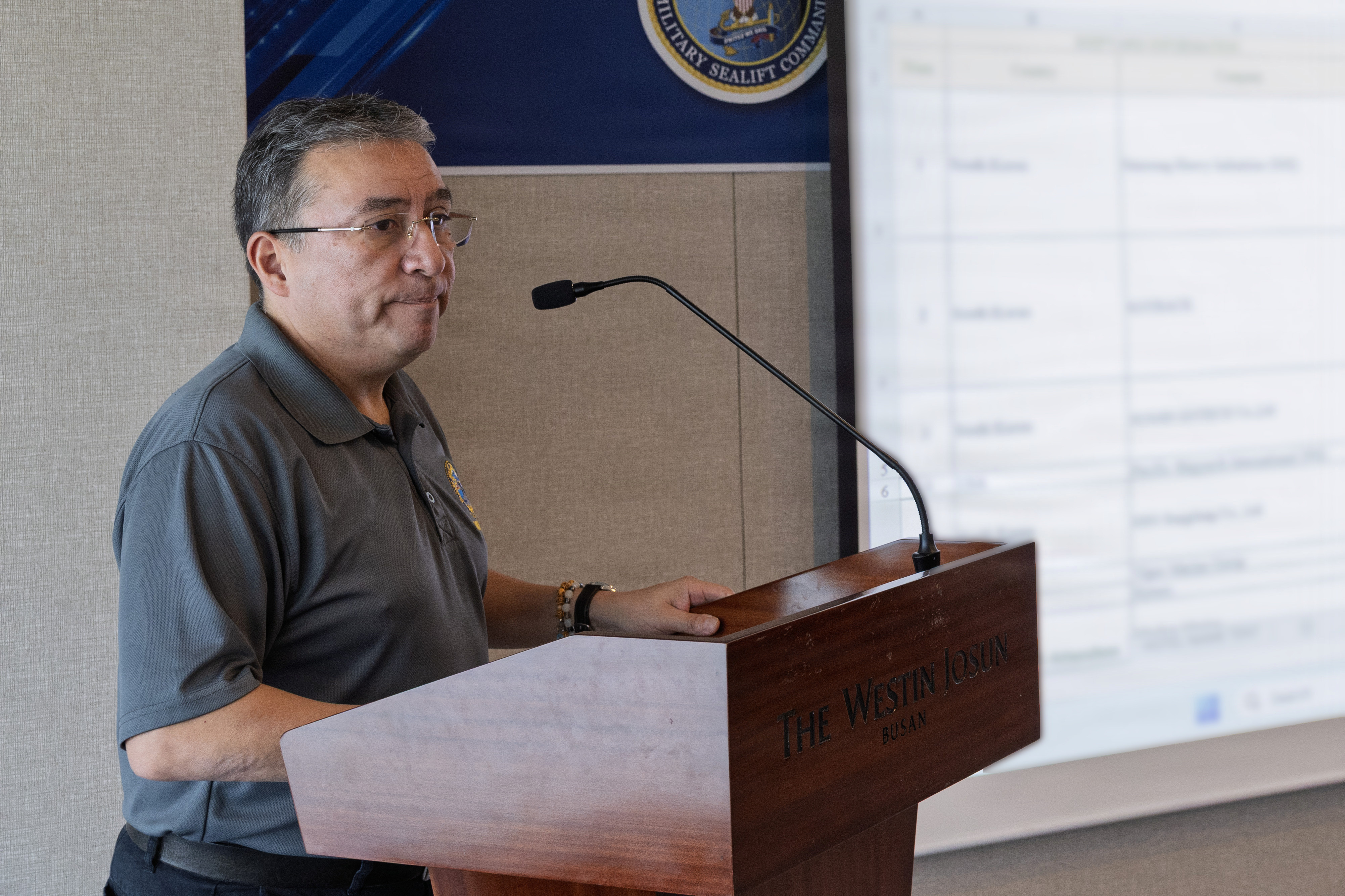 U.S. Navy Capt. David L. Reyes, commodore, Military Sealift Command (MSC) Far East, gives opening remarks during Industry Day, at a hotel conference room in Busan, Feb. 10, 2026.