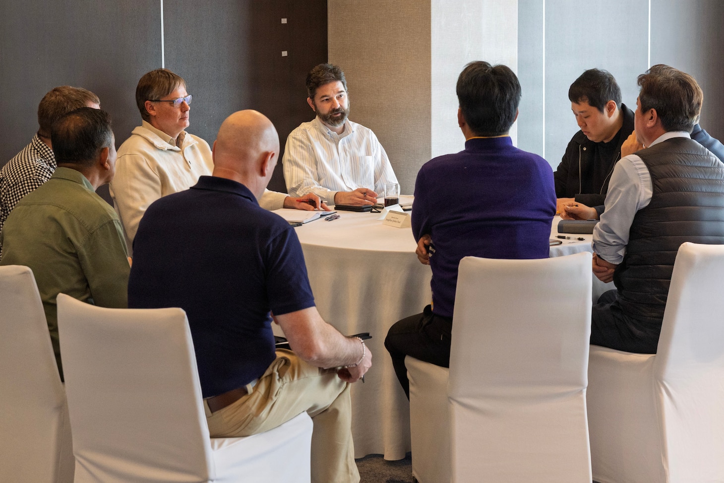 Representatives from Military Sealift Command (MSC) speak with representatives from South Korea’s shipping industry during Industry Day, at a hotel conference room in Busan, Feb. 10, 2026.