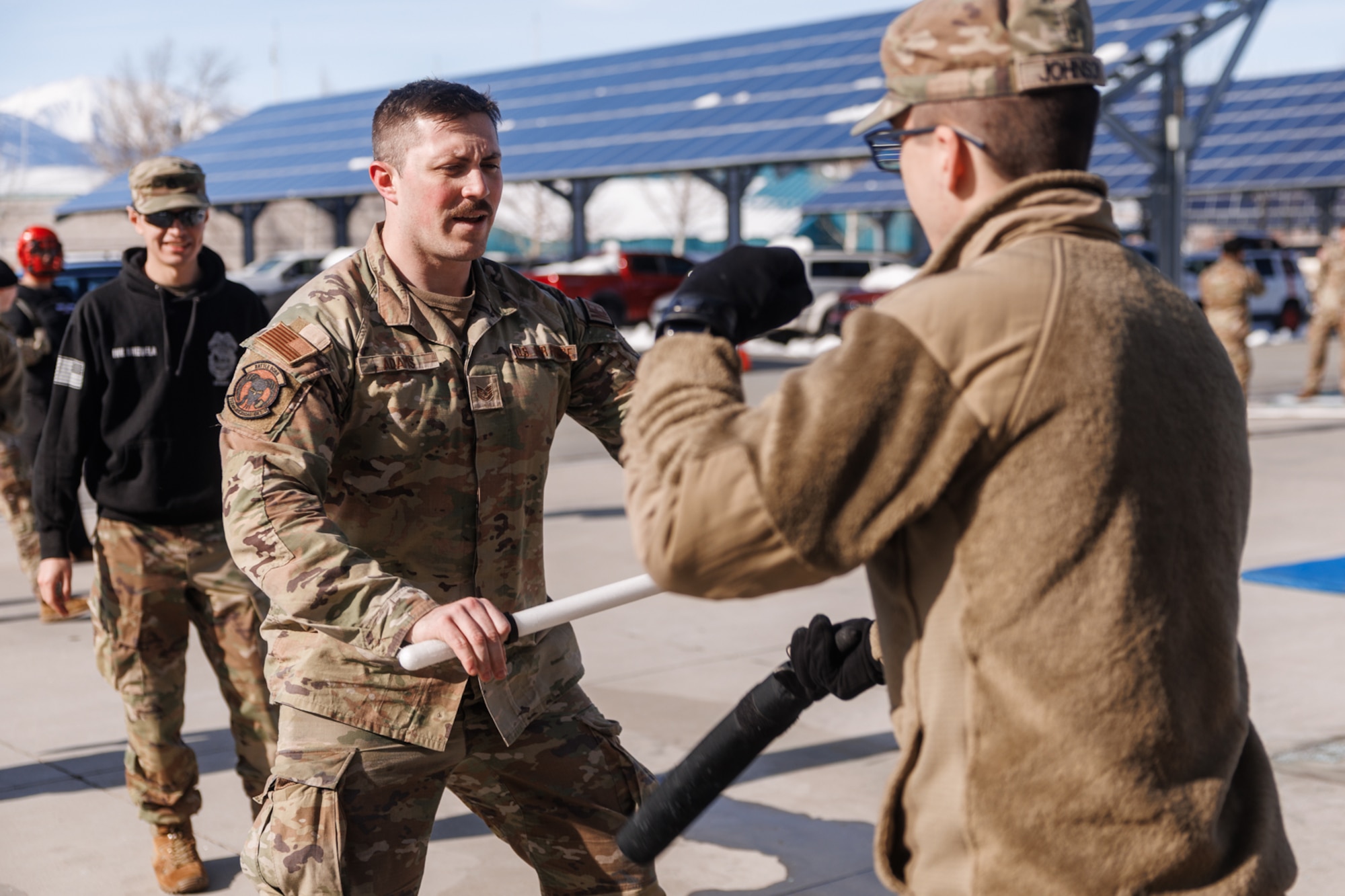 U.S. Air Force Tech Sgt. Adams, 152nd Medical Group, practices defending himself using his baton during a National Guard Response Force training at the Office of the Adjutant General in Carson City, Nevada, Feb. 20, 2026. NGRF personnel will be prepared to respond to Nevada's needs, ready within 24 hours activation, like the activation during the Davis Creek fire in 2024 to safeguard evacuated neighborhoods. (U.S. Army National Guard photo by Sgt. Adrianne Lopez)