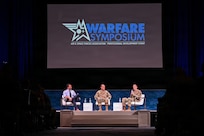 Air Force leaders speak at a panel.