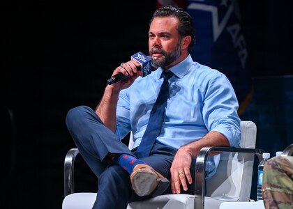 An Air Force leader speak at a panel.