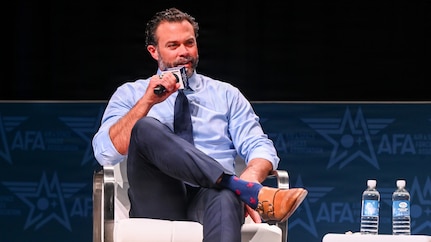 An Air Force leader speak at a panel.