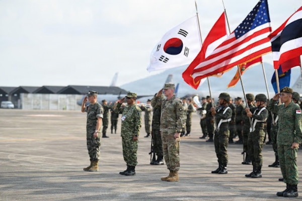 Military leaders from participating nations render a salute at the opening ceremony of Exercise Cobra Gold 2026 in Rayong Province, Thailand, Feb. 24, 2026.