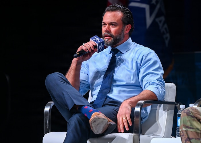 An Air Force leader speak at a panel.