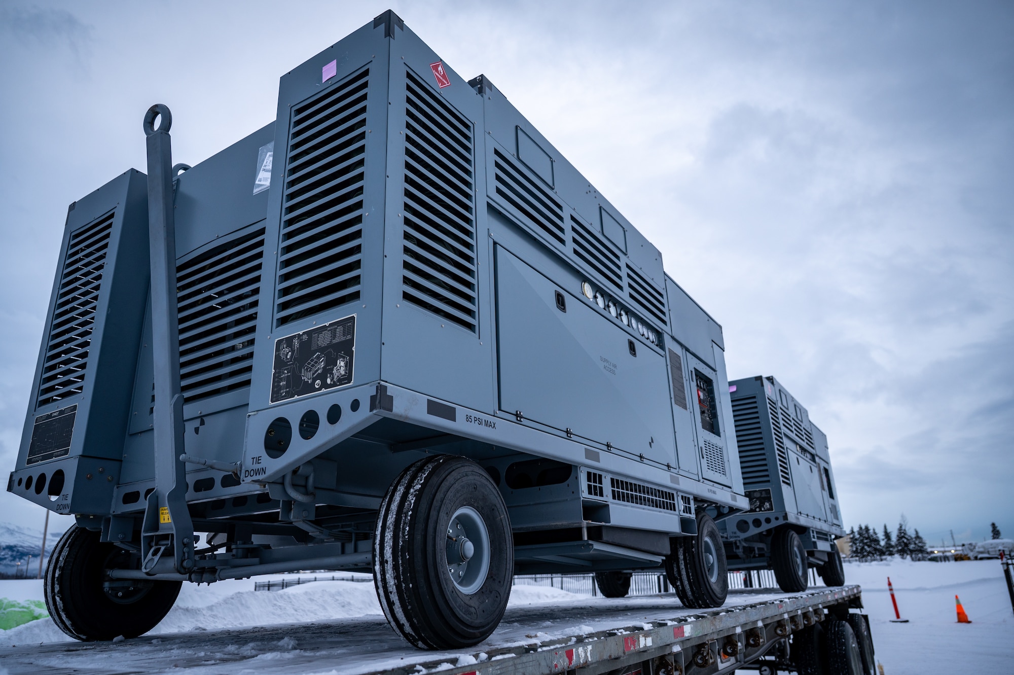 Prepositioned Warfighting Materiel sits on a trailer at Joint Base Elmendorf-Richardson, Alaska, Jan. 15, 2026. This effort, central to the Air Force's Agile Combat Employment scheme of maneuver, shifts critical equipment to strategic locations throughout the Indo-Pacific to increase survivability while generating combat power. (U.S. Air Force photo by Senior Airman Hunter Hites)