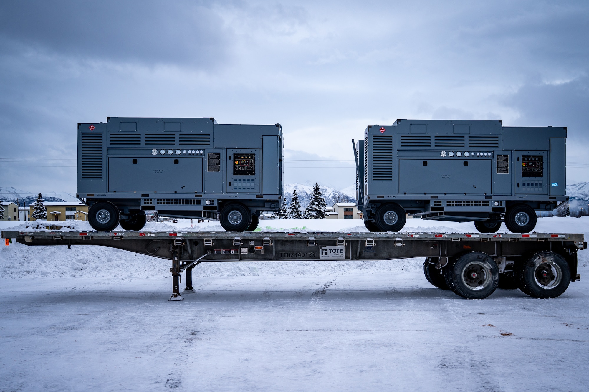 Prepositioned Warfighting Materiel sits on a trailer at Joint Base Elmendorf-Richardson, Alaska, Jan. 15, 2026. This effort, central to the Air Force's Agile Combat Employment scheme of maneuver, shifts critical equipment to strategic locations throughout the Indo-Pacific to increase survivability while generating combat power. (U.S. Air Force photo by Senior Airman Hunter Hites)