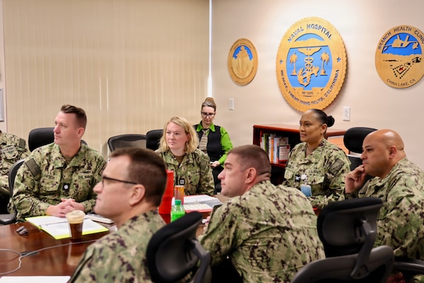 TWENTYNINE PALMS, Calif. (Feb. 19, 2026) — Lt. Gillian Gutierres participates in an executive steering committee meeting during the Commanding Officer for a Day program at Navy Medicine Readiness and Training Command Twentynine Palms. Pictured from left are interim executive officer Cmdr. William “Bill” Lawson; chief nursing officer Capt. Mark Miller; Gutierres; public health specialist Tanya Stuckey; director for administration Lt. Cmdr. Charles Brinegar; commanding officer Capt. Janiese Cleckley; and Command Master Chief Richard Moreno.