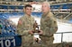 Spc. Alexavier L. Munoz (left) accepted the Tobyhanna Army Depot Outstanding Active-Duty Servicemember award from Maj. Joseph A. Page (right).