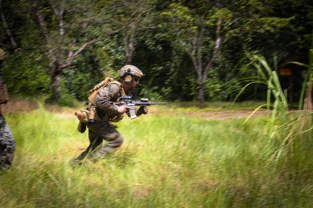 U.S. Marine Corps Sgt. Nicholas Lopezgarcia, a squad leader with 2nd Combat Engineer Battalion, 2nd Marine Division, sprints down range toward a simulated target during a live-fire fire team attack range at Camp Cerro Tigre, Panama, Feb. 19, 2026. The training, conducted as part of Panamanian Partnership 26, enhanced interoperability and shared capabilities by enabling U.S. Marines with 2nd CEB to train alongside Panamanian security institutions in a combined training environment. (U.S. Marine Corps photo by Sgt. Antonino Mazzamuto)