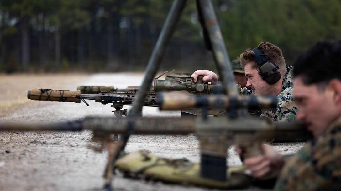 U.S. Marine Corps Cpl. Casey Peterson, an infantry scout with 3rd Battalion, 2nd Marine Regiment, 24th Marine Expeditionary Unit, engages targets with a MK 22 Mod 0 Advanced Precision Rifle during a precision range as part of the 24th MEU’s certification exercise on Marine Corps Base Camp Lejeune, North Carolina, Feb. 18, 2026. CERTEX is a land-based pre-deployment exercise that enhances the integration and collective capability of the Marine Air-Ground Task Force while providing the 24th MEU with an opportunity to train and execute operations in austere and urban environments. (U.S. Marine Corps photo by Lance Cpl. Brian Bolin Jr.)